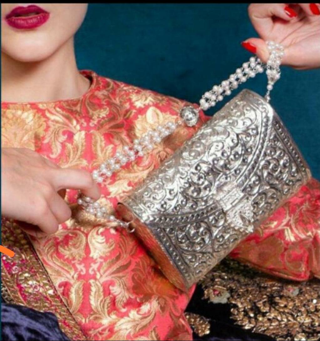 Silver color brass clutch with pearl handle