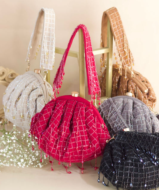 Cutdana suede base batua bags with crystal droplets and cutdana belt handle