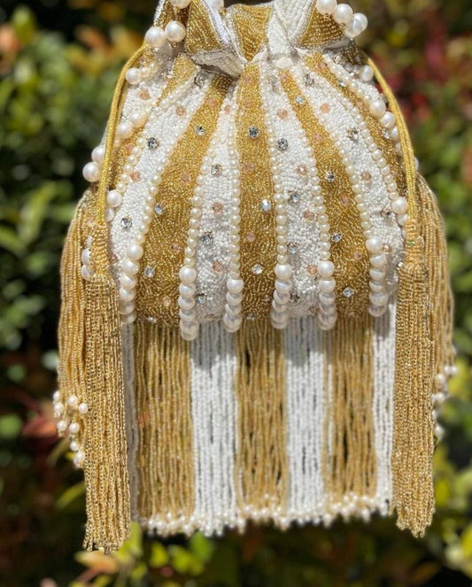 Golden & white potli bag with pearl work