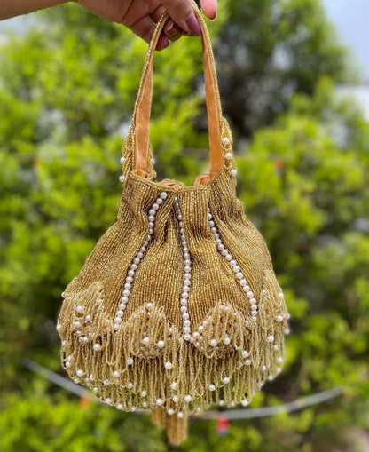 FANAH potli with bead work and tassels