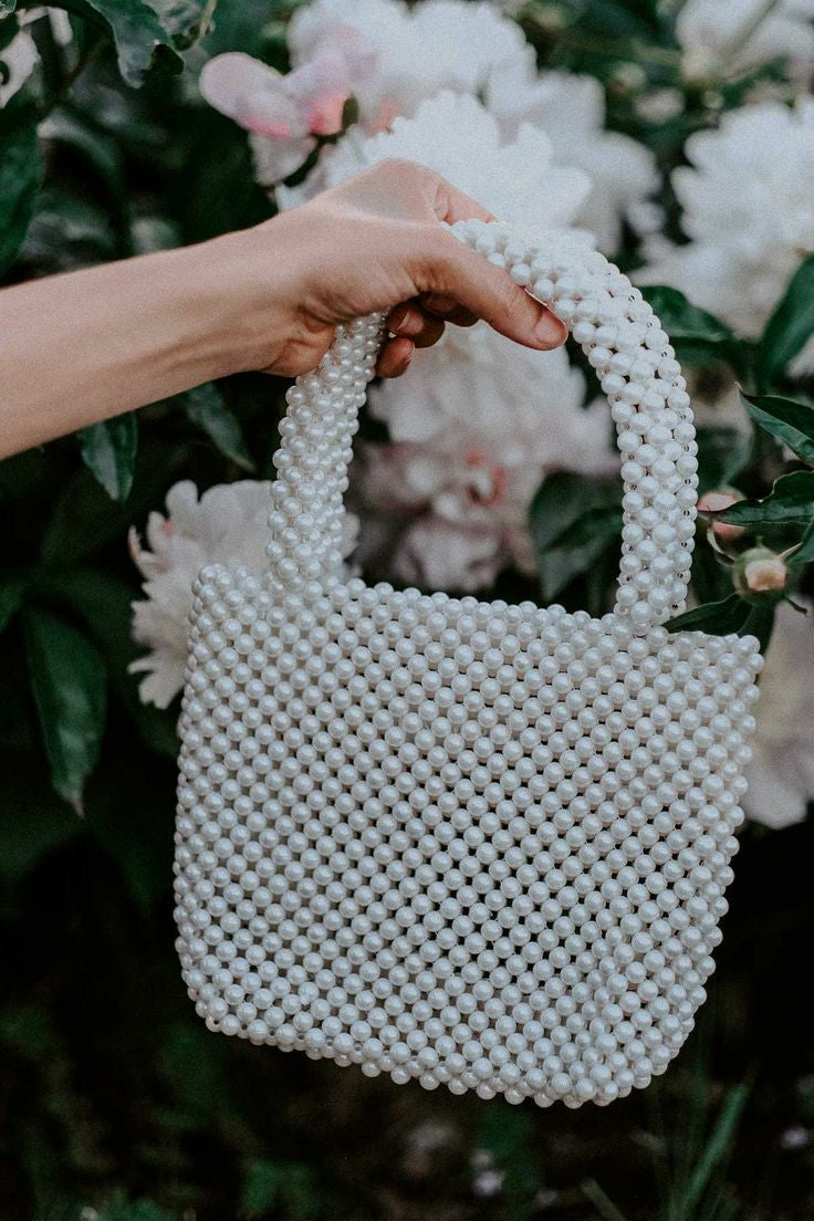 Designer pearl bag with pearl handle